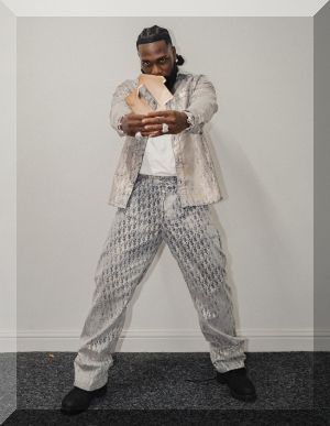 Burna Boy celebrates his Official Albums Chart Number 1 with a Number 1 Award from the Official Charts Company for I Told Them… (credit: Official Charts)