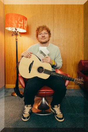Ed Sheeran poses with his Official Number 1 single award for Eyes Closed (Credit: Mushroom Creative House/Liam Pethick)
