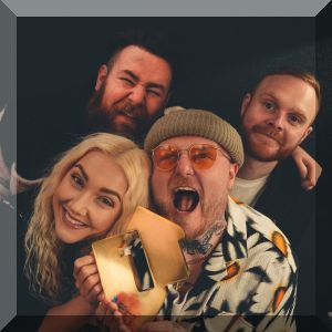 The Lottery Winners pose with their Official Number 1 Album Award for Anxiety Replacement Therapy (credit: Official Charts Company) 